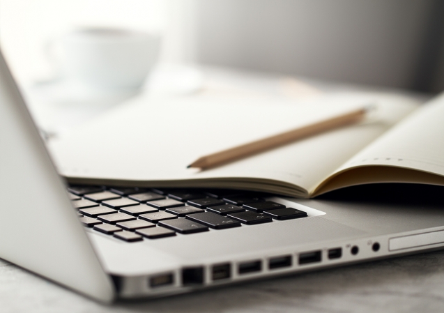 Clever student making notes at lesson