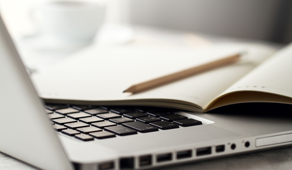 Clever student making notes at lesson