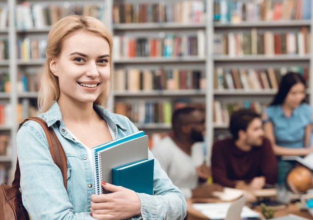 Clever student making notes at lesson
